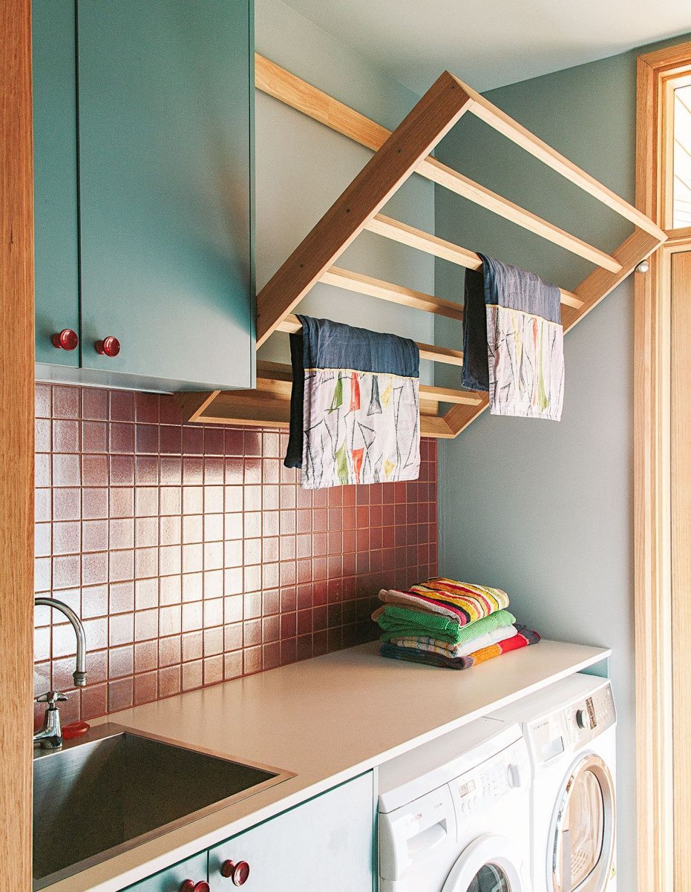 What are some tips for choosing the best color for a laundry room?