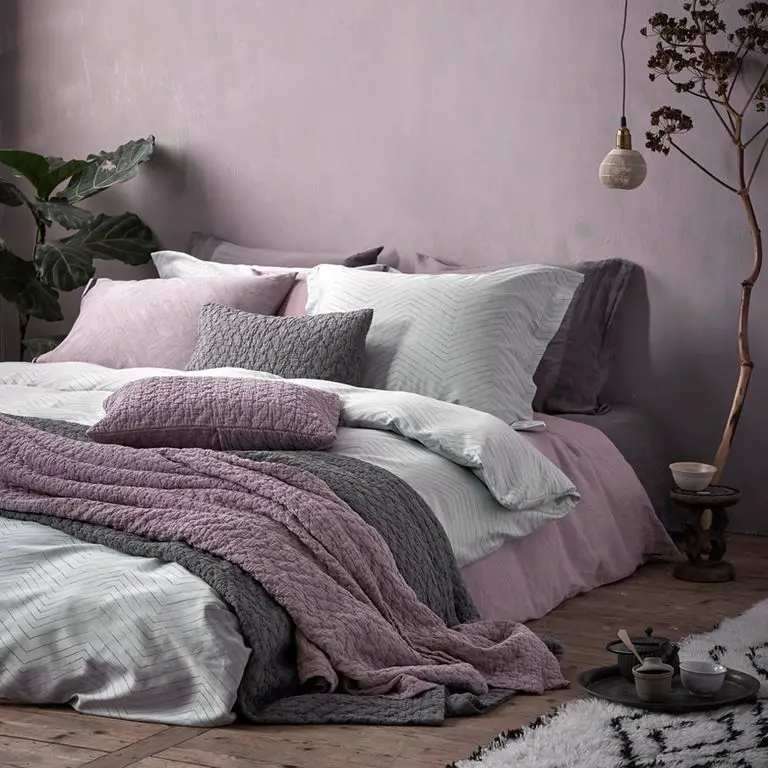 “Purple Haze”: Lavender and plum hues add a touch of elegance and sophistication to the room.