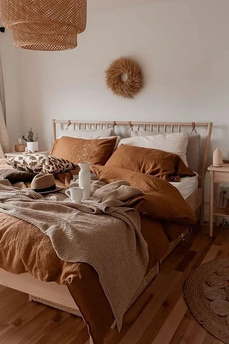 “Rustic Charm”: Deep oranges and warm browns with textured finishes create a cozy and inviting space with a touch of…