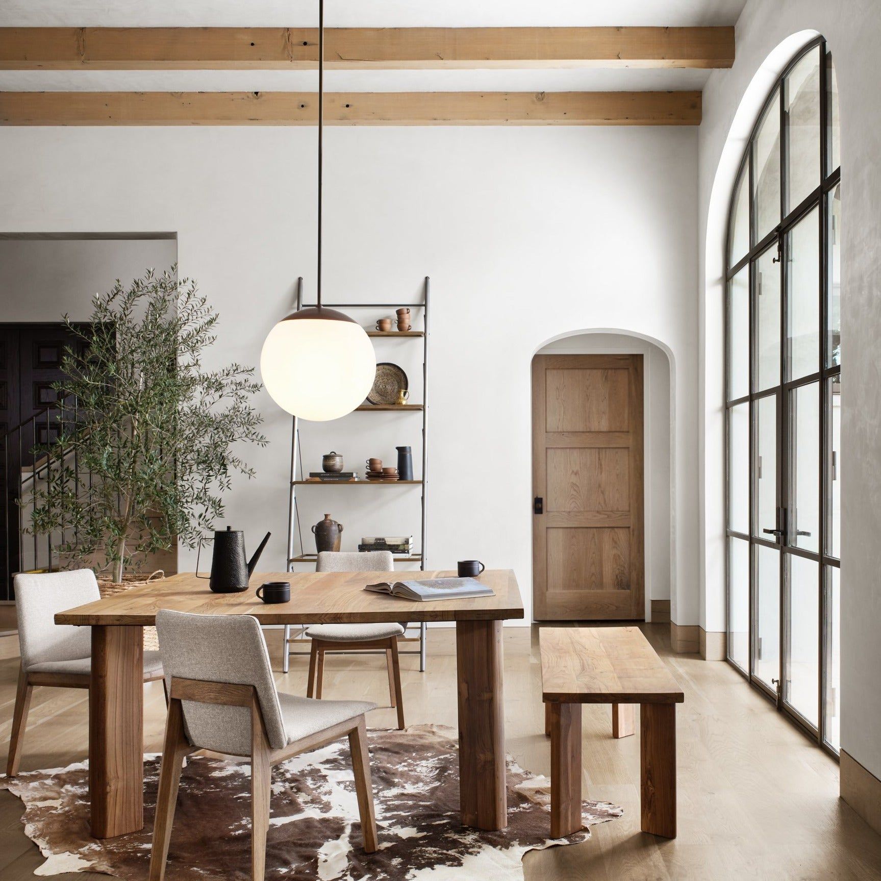 What are some design tips for maximizing the advantages of natural lighting in a home’s interior design?
