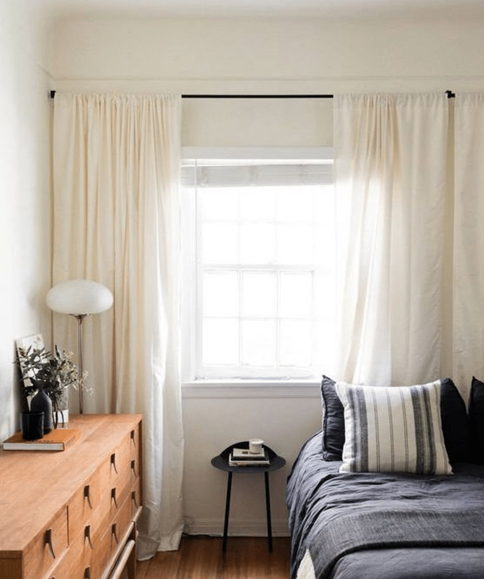 Transforming Your Room: Strategies for Hiding a Center Window and Making Your Bed the Star