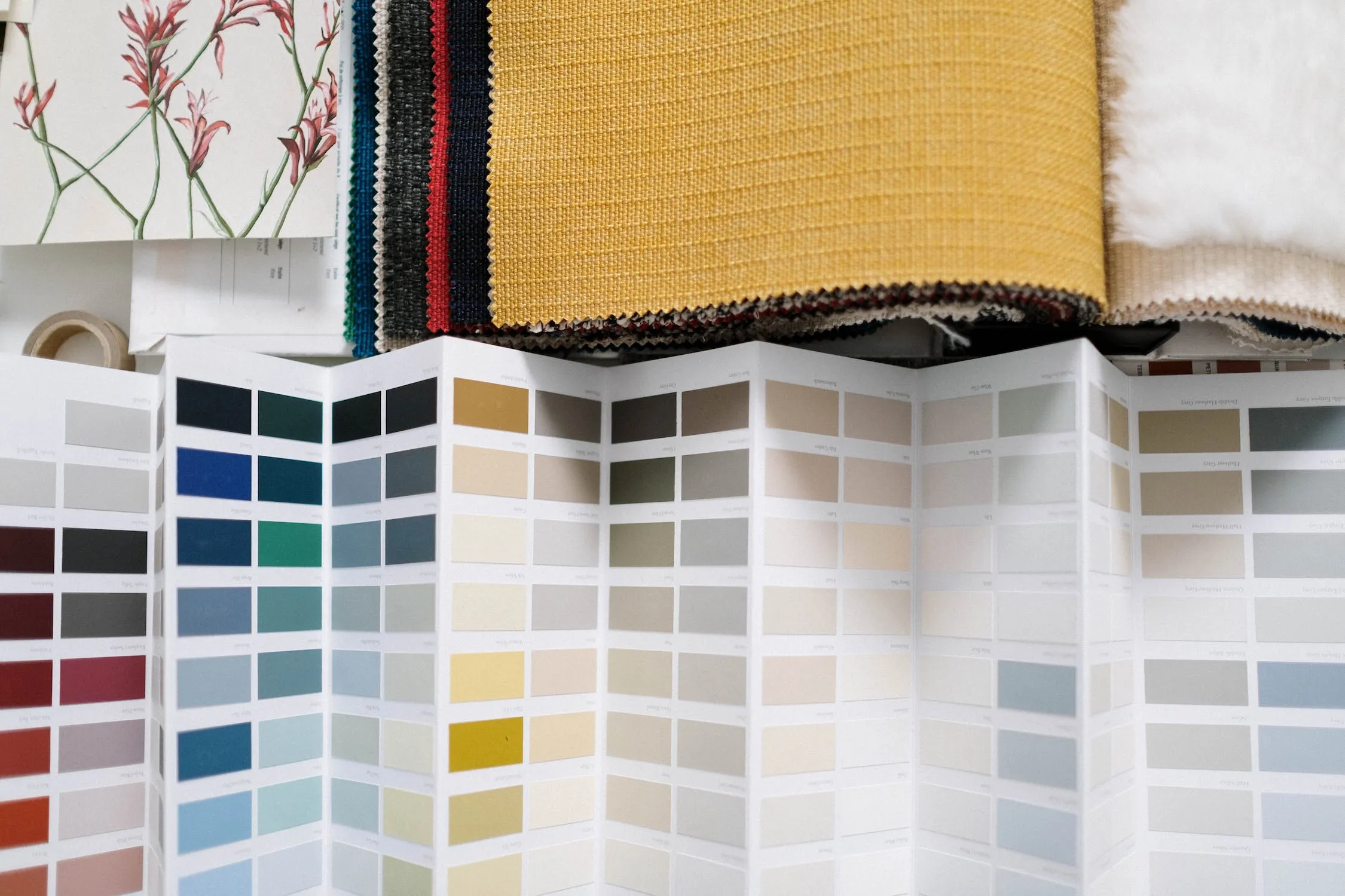 What are some tips for working with interior designers to ensure my style and needs are met while keeping things within my…
